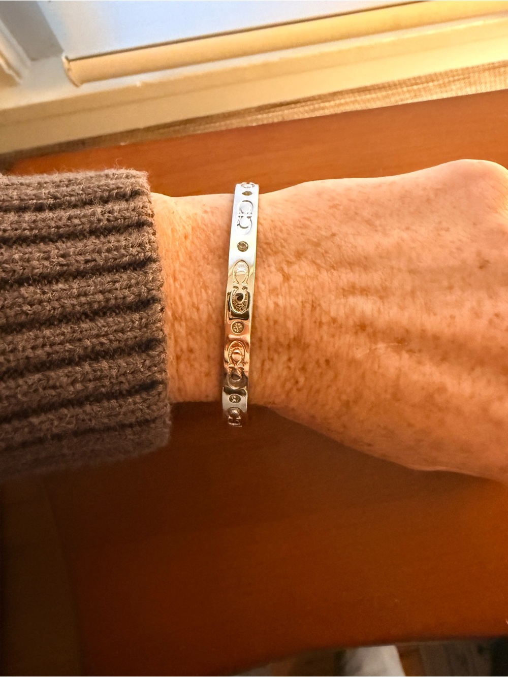 Coach Silver-Tone Logo Bangle with Crystal Accents - Picture 5 of 5
